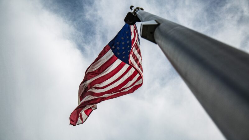 Glancing Upon Old Glory On A Flag Pole