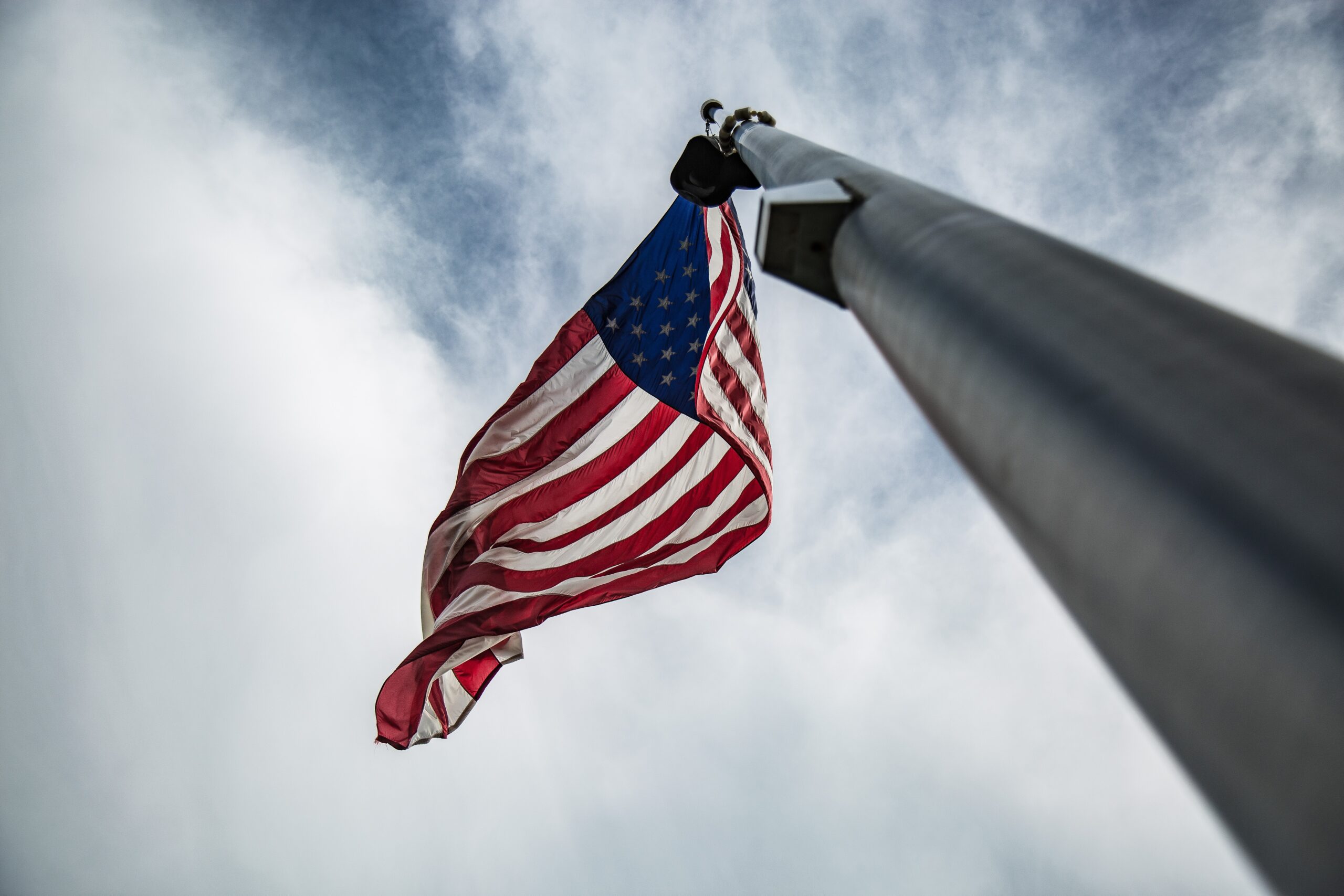 Glancing Upon Old Glory On A Flag Pole